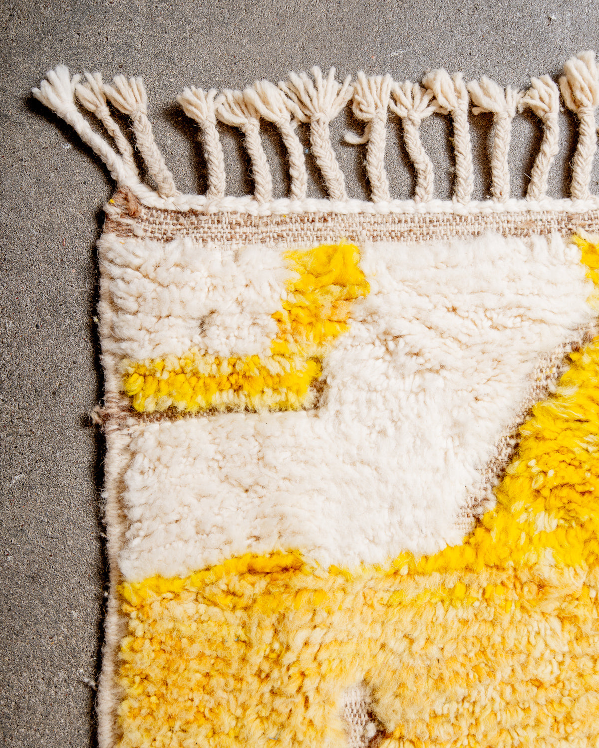Modern, designer, handcrafted Berber rug from Morocco. Beniourain carpet with beautiful colours and patterns and fluffy wool texture.